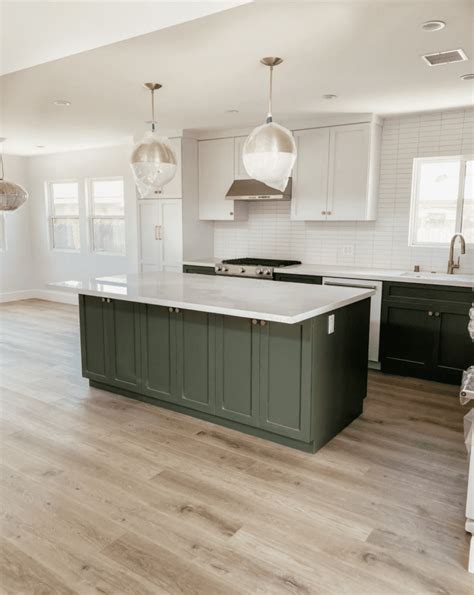 Pewter Green is a dark green paint color with gray undertones, used in a nursery by Kaitlin Madden. . Pewter green sherwin williams